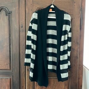 Tory Burch grey and black striped sweater.